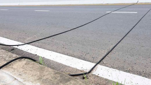 if-you-ever-see-black-cables-stretching-across-the-road,-this-is-what-you-should-do